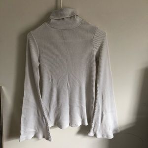 White turtle neck with bell sleeves